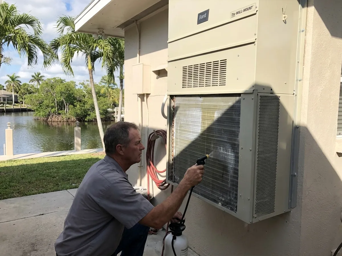 Wentzel's technician applying coastal coil coating near Palma Sola, Bradenton