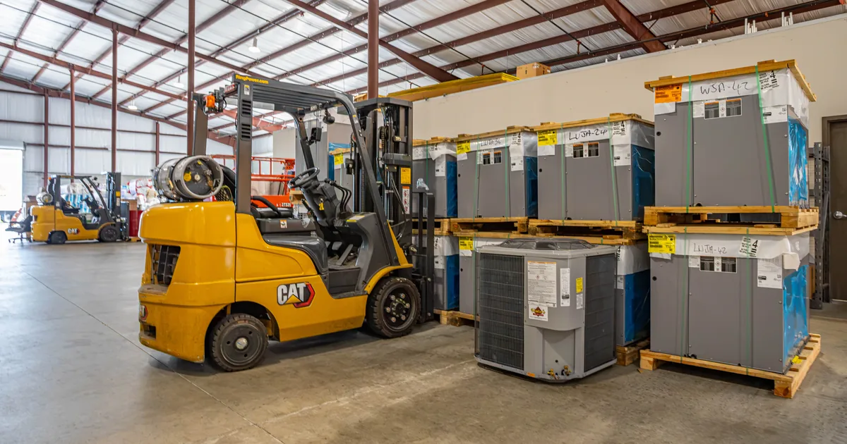 New outdoor AC condensers and indoor air handlers in stock at Wentzel's Sarasota warehouse