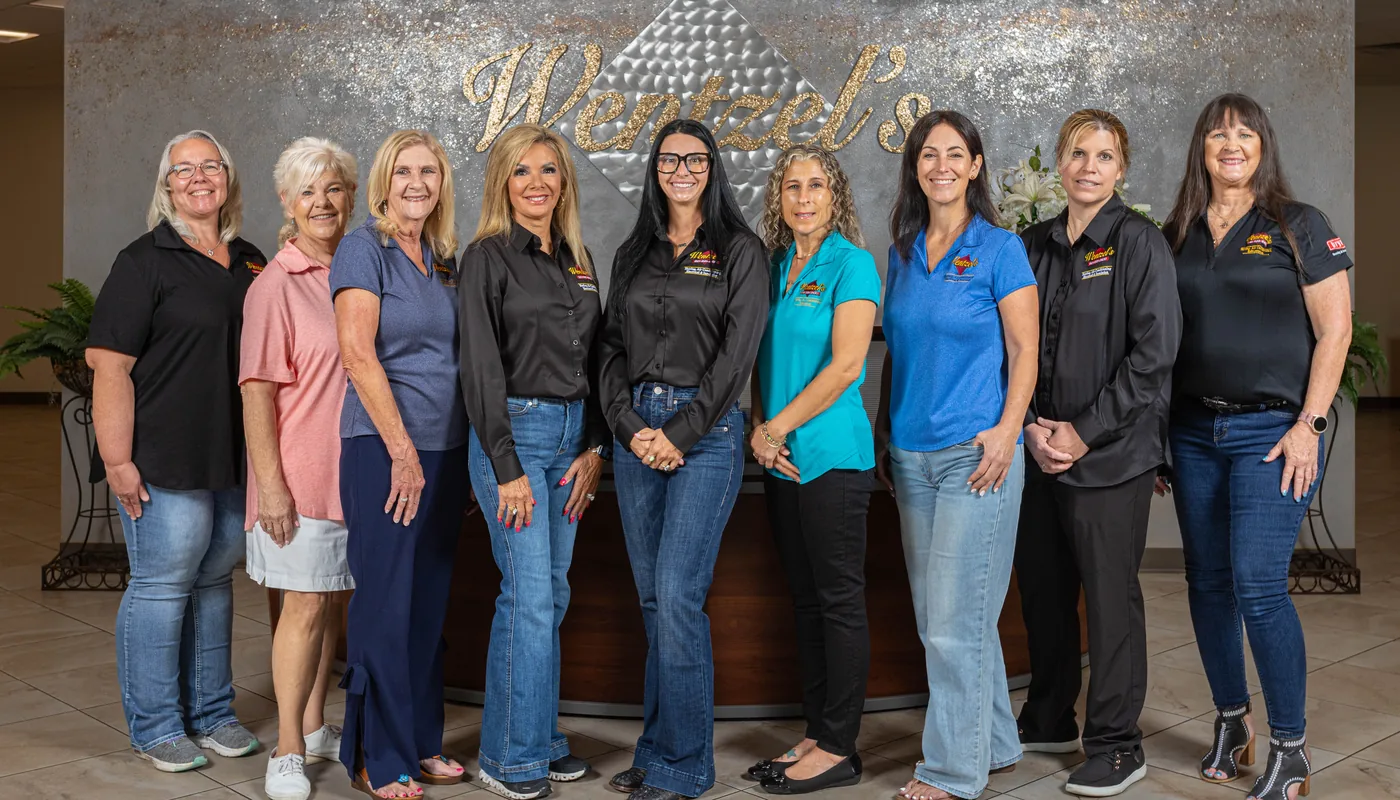 The Wentzel's office team in the lobby of the company's Sarasota headquarters
