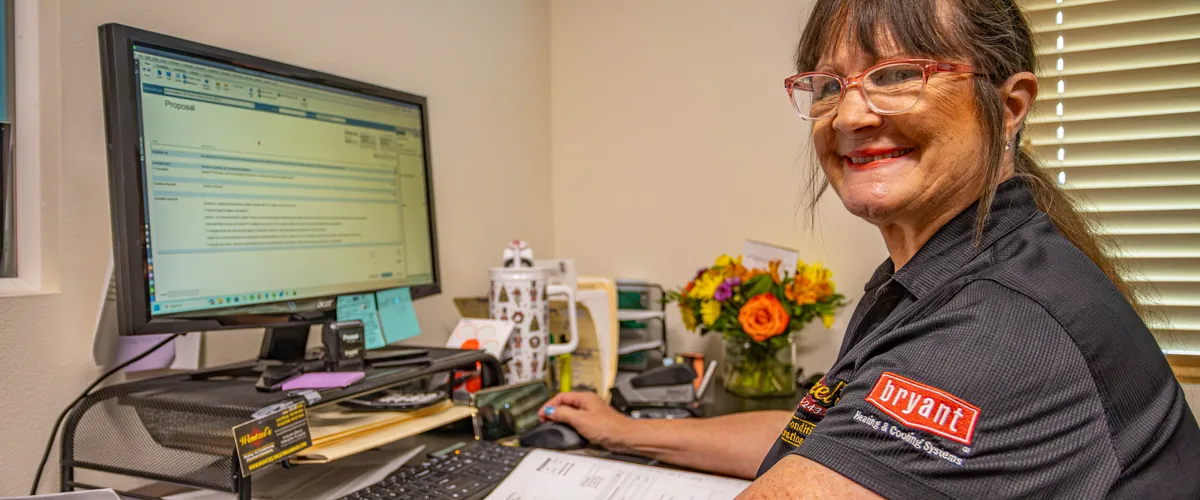 Wentzel's office team member at a workstation in the Sarasota office