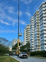 Lifting air conditioner to the St. Andrew Condo